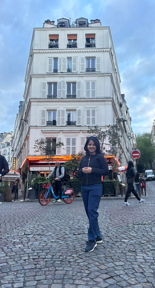 Surabhi Jha on a cobbled street in Montmartre, Paris